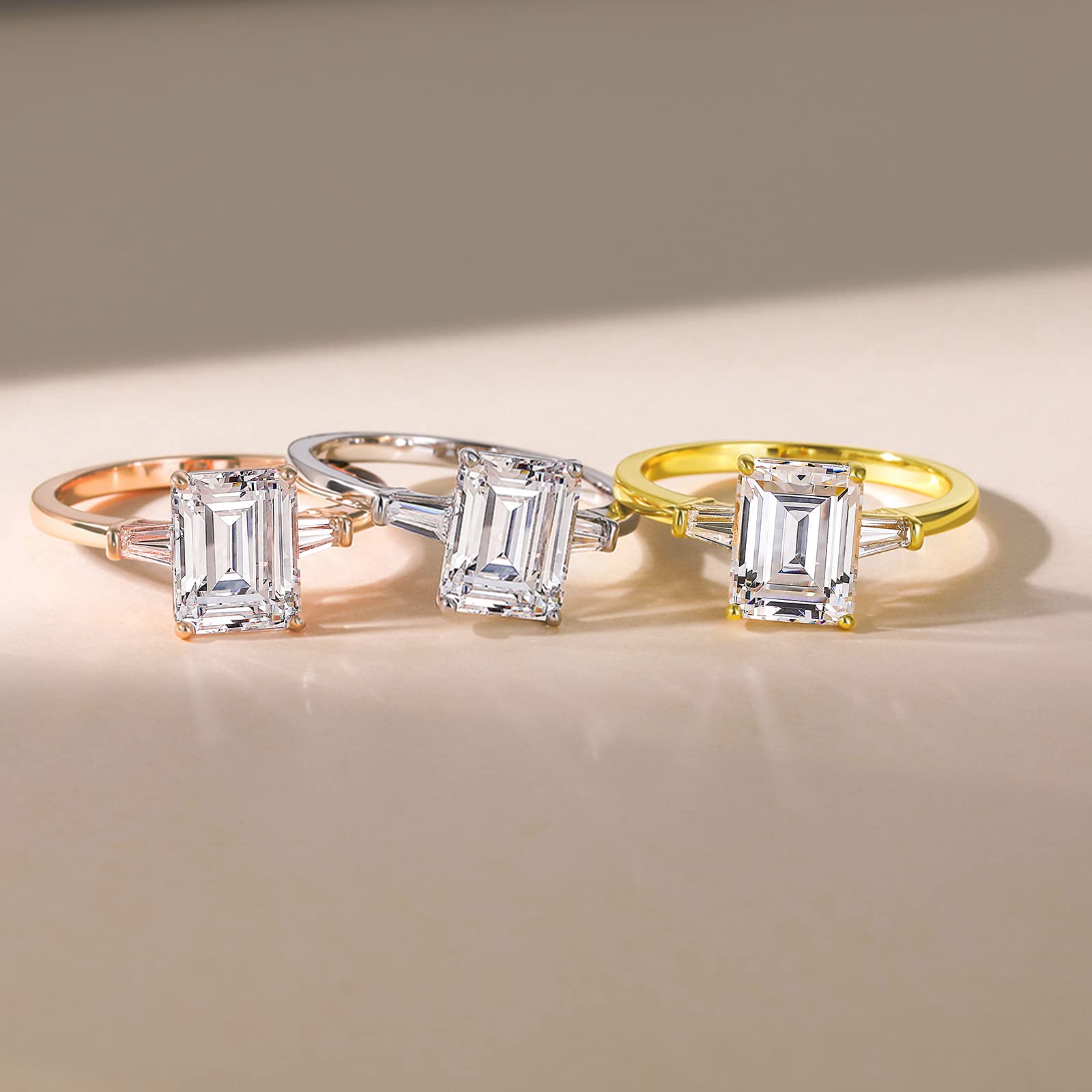 Emerald-cut three-stone ring