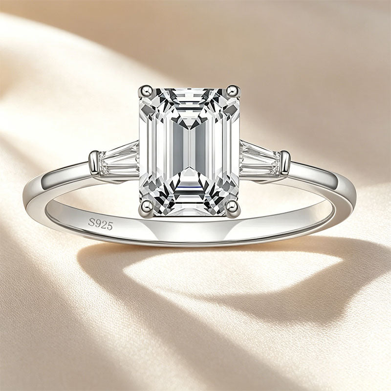 Emerald-cut three-stone ring