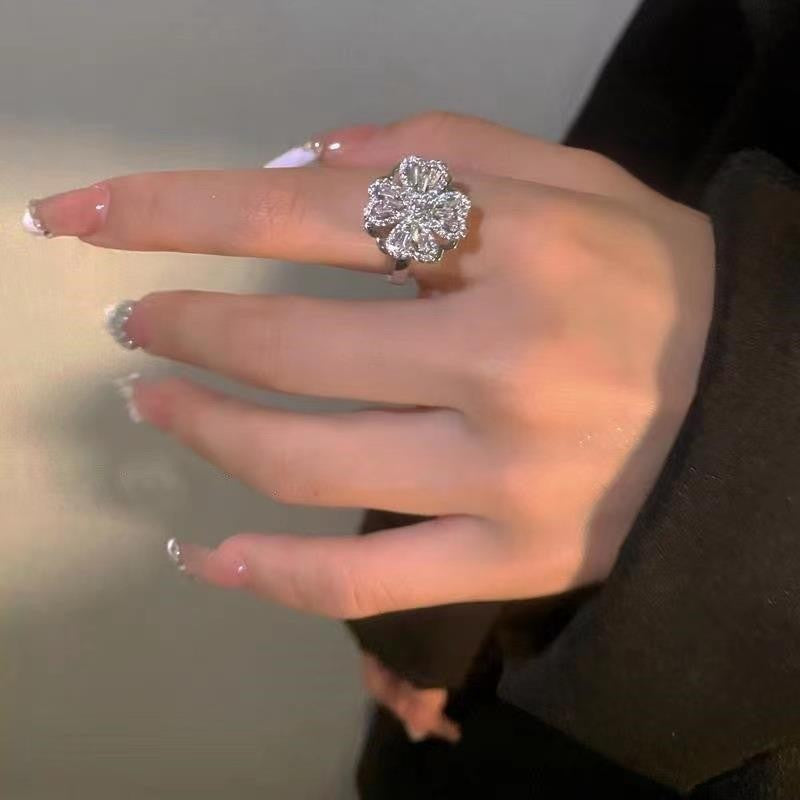 Rotating Four-Leaf Clover Moissanite Ring