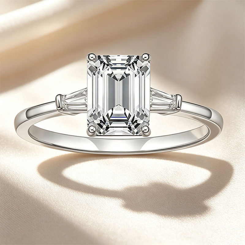 Emerald-cut three-stone ring