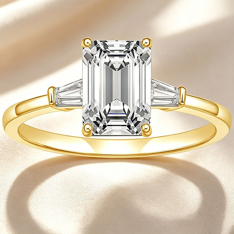 Emerald-cut three-stone ring